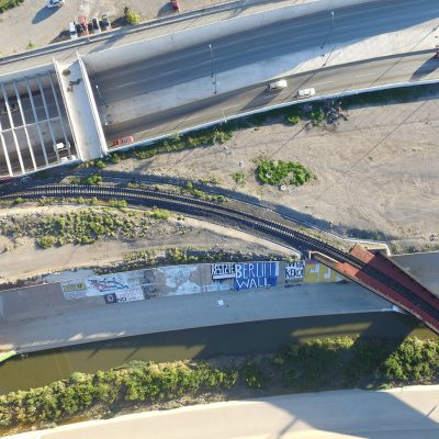 Drone photograph of mural "Berlin Wall" drone shot of us mexico border in CDJ